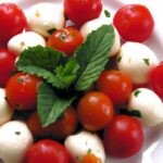 Burst of Flavor: Marinated Mozzarella Balls with Cherry Tomatoes